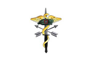 A medical symbol with a sword and other items.